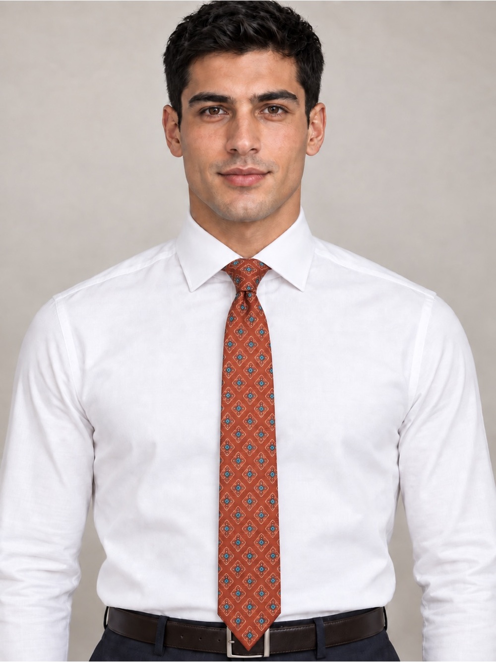 Kiton Rust Patterned Silk Tie with Repeating Blue Diamonds